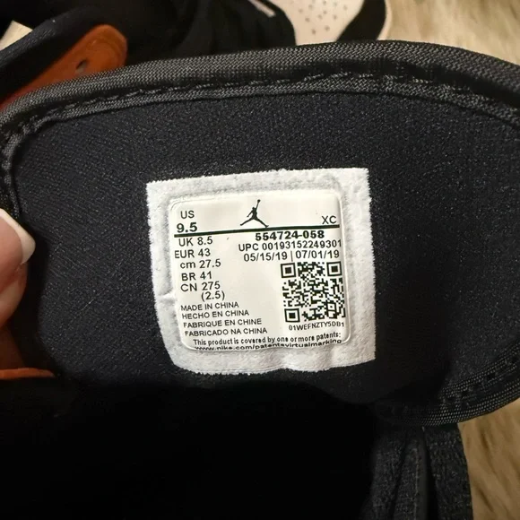 Air Jordan Black and Orange Sneakers